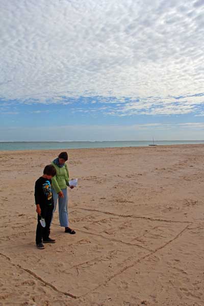 Schreiben im Sand